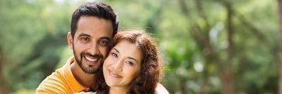 Two people smiling post cosmetic dentist visit in Springfield Missouri