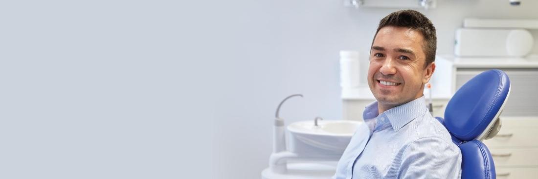 Patient smiling at emergency dentist in Springfield MO