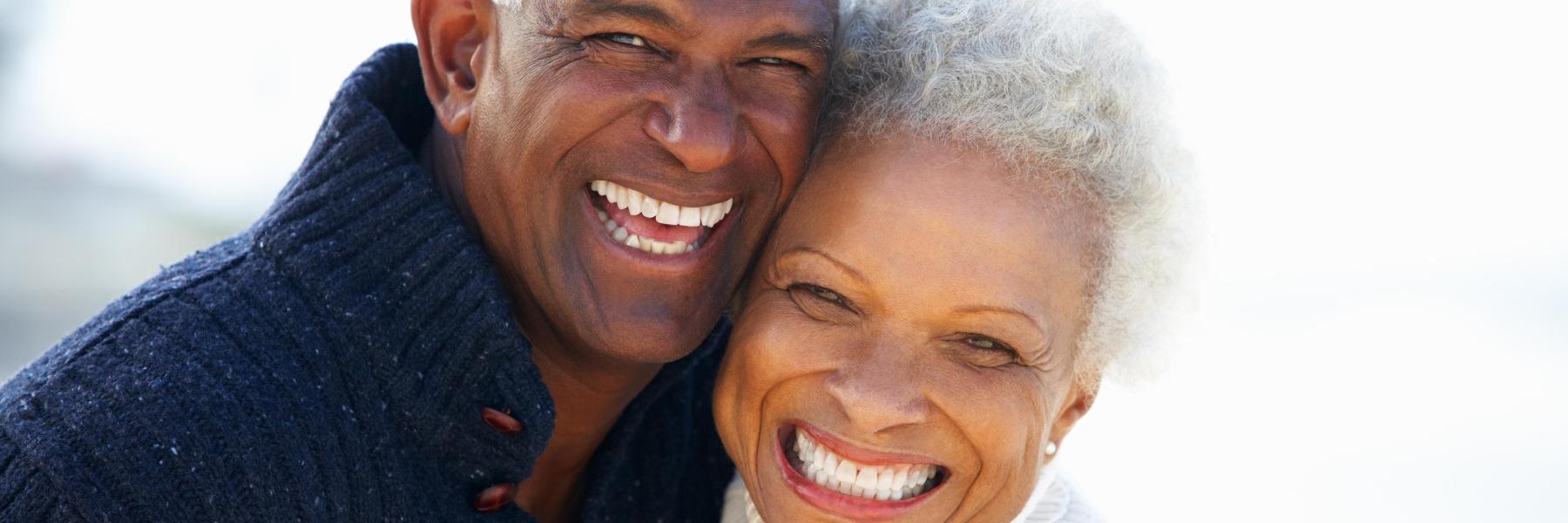 Couple with dental implants in springfield mo