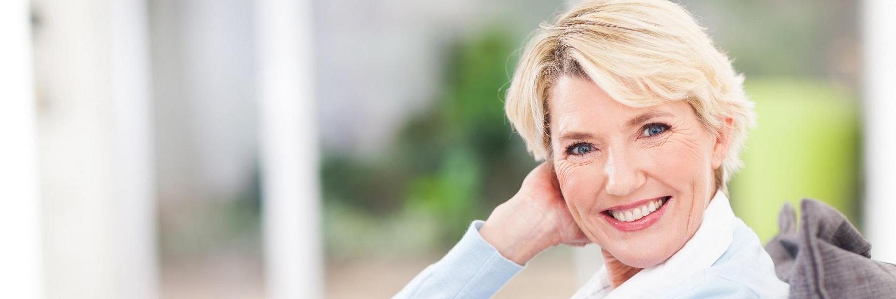 Woman smiling with implants in Springfield, MO
